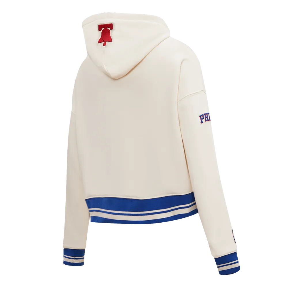 NBA PHILADELPHIA 76ERS RETRO CLASSIC WOMEN'S CROPPED PO HOODIE (EGGSHELL/ROYAL BLUE)