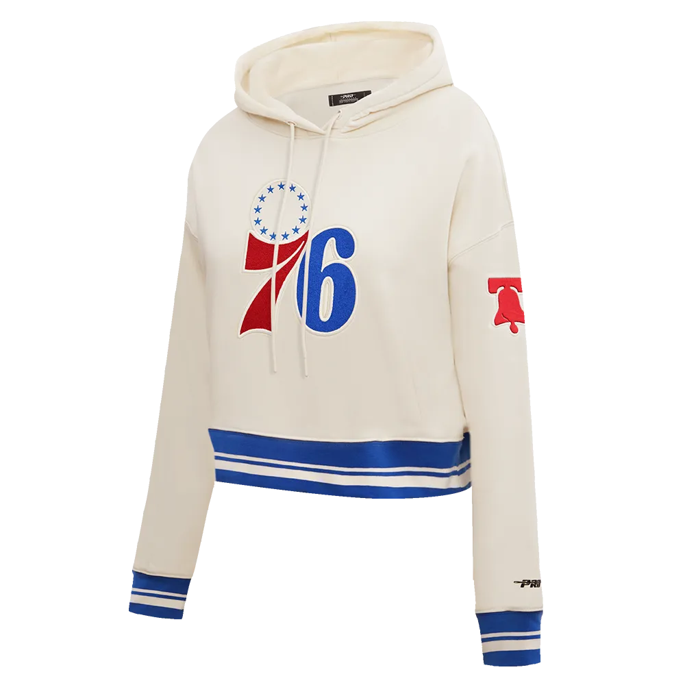 NBA PHILADELPHIA 76ERS RETRO CLASSIC WOMEN'S CROPPED PO HOODIE (EGGSHELL/ROYAL BLUE)